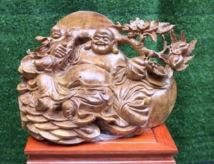 Tượng Di Lặc Cây Đào: Món Quà Tặng Mừng Thọ Ý Nghĩa Và Tinh Tế