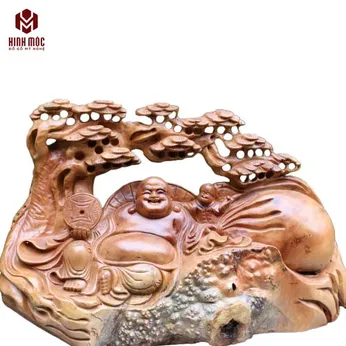 Di Lặc để bàn gỗ nu xá xị