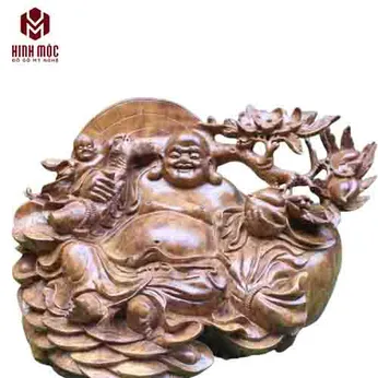 Di Lặc ngồi gốc đào gỗ nu xá xị