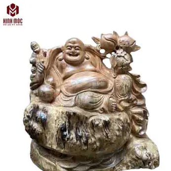 Tượng Di Lặc vác cành đào gỗ xá xị