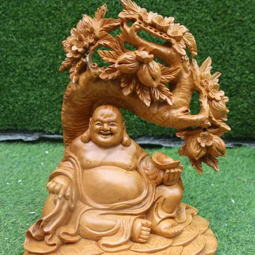 Di Lặc ngồi đào gỗ xá xị