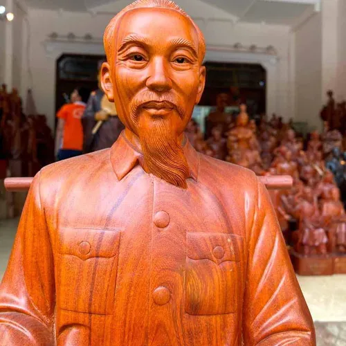 Tượng gỗ Bác Hồ ngồi đọc báo cao 60cm