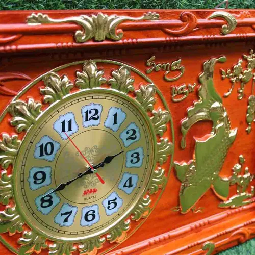 Đồng hồ gỗ cá chép