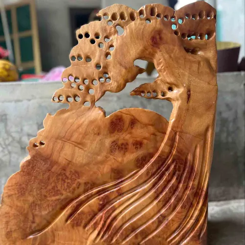 Di Lặc tùng gỗ lũa xá xị