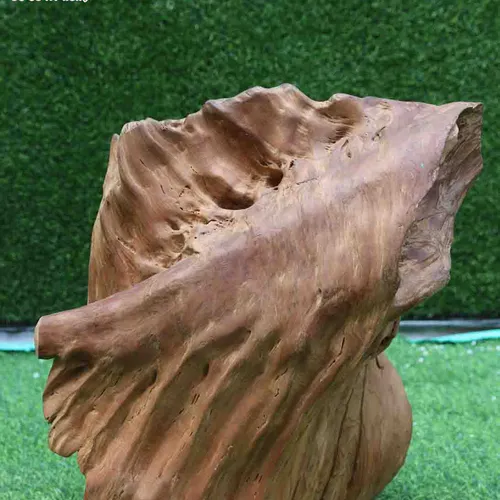 Di Lặc ngồi cầm vàng gỗ ngọc am