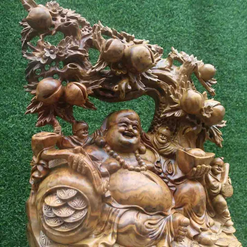 Di Lặc ngồi gốc cây đào cao 67cm gỗ xá xị