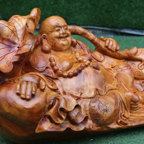 Di Lặc ngồi vác lá sen gỗ hương