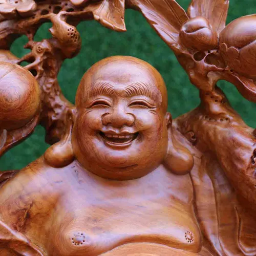 Di Lặc ngồi vác cành đào gỗ hương