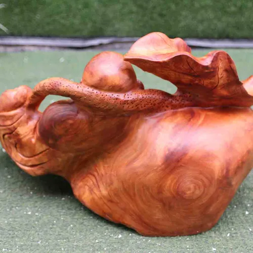 Di Lặc ngồi vác lá sen gỗ hương