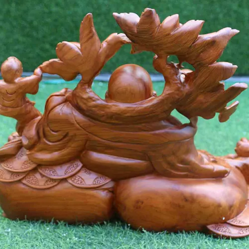 Di Lặc ngồi vác cành đào gỗ hương