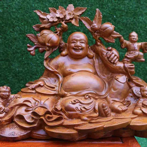 Di Lặc ngồi vác cành đào gỗ hương