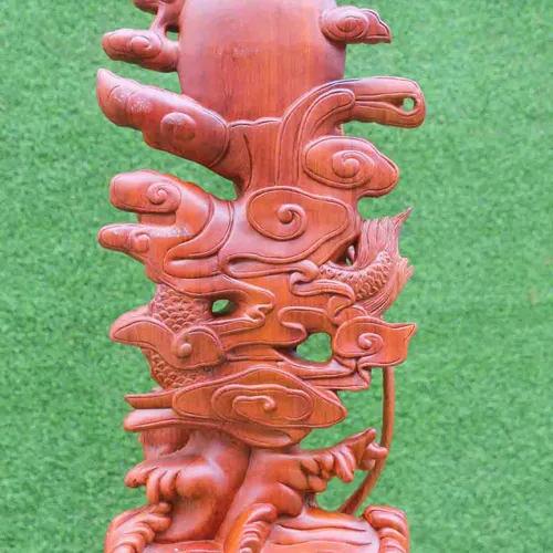 Quan Âm ngự long cao 70cm gỗ hương