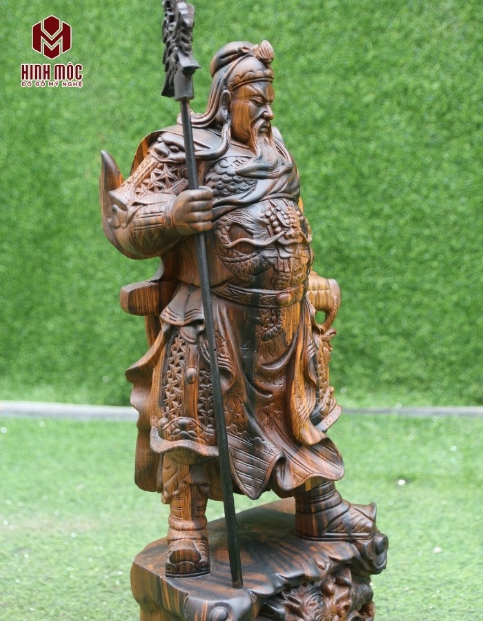 tượng Quan Công chống đao gỗ mun hoa chụp nghiêng trái tượng Quan Công chống đao gỗ mun hoa chụp nghiêng trái