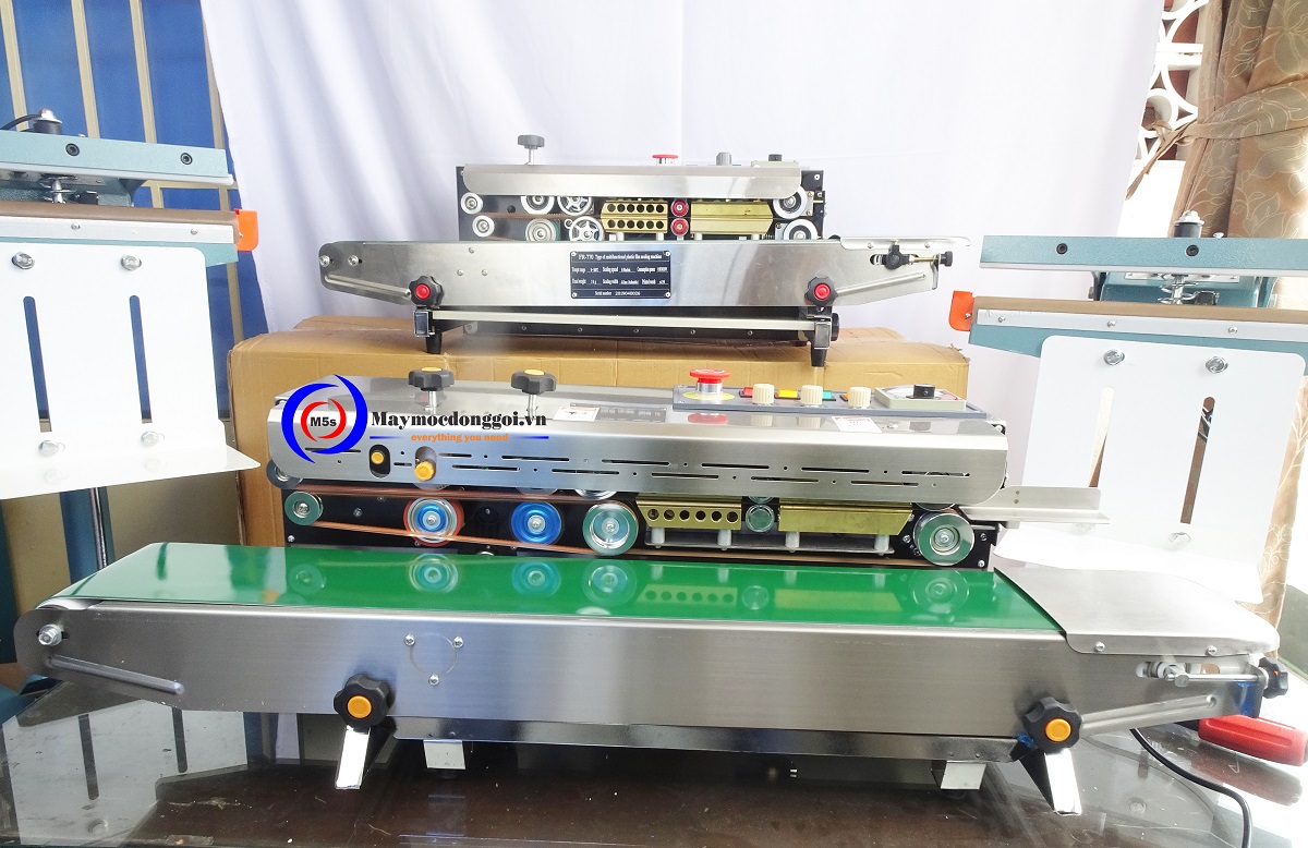 máy hàn miệng túi liên tục dạng đứng Cách phân biệt máy hàn miệng túi liên tục dạng đứng và dạng nằm ngang