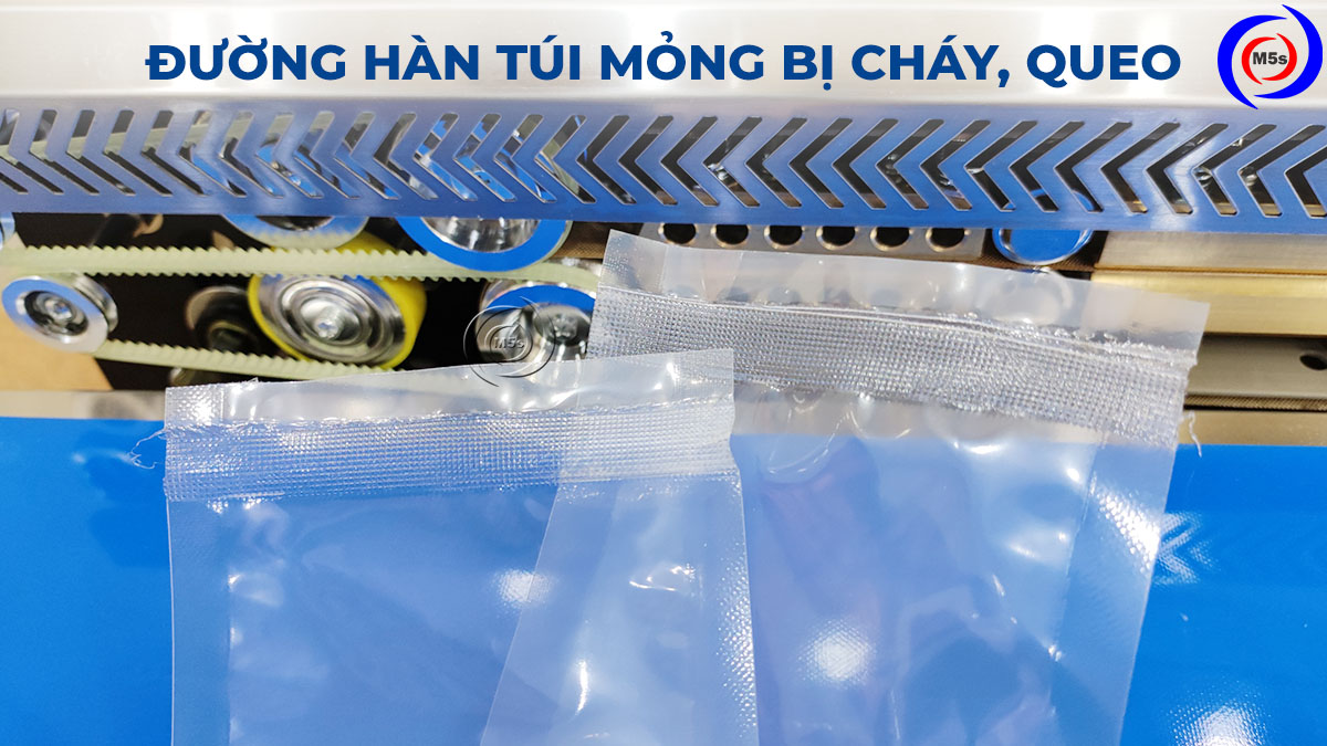 Đường hàn miệng túi bị cháy, queo Đường hàn miệng túi bị cháy, queo