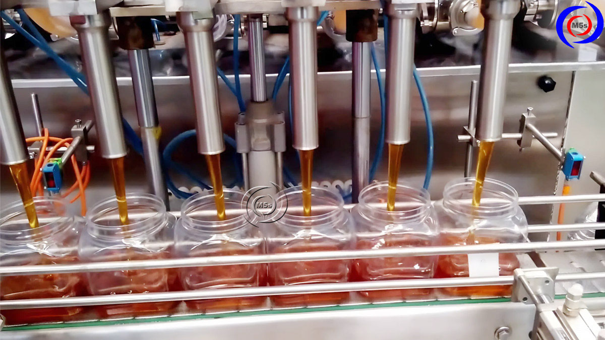 Máy chiết rót dung dịch vào chai Máy chiết rót dung dịch vào chai