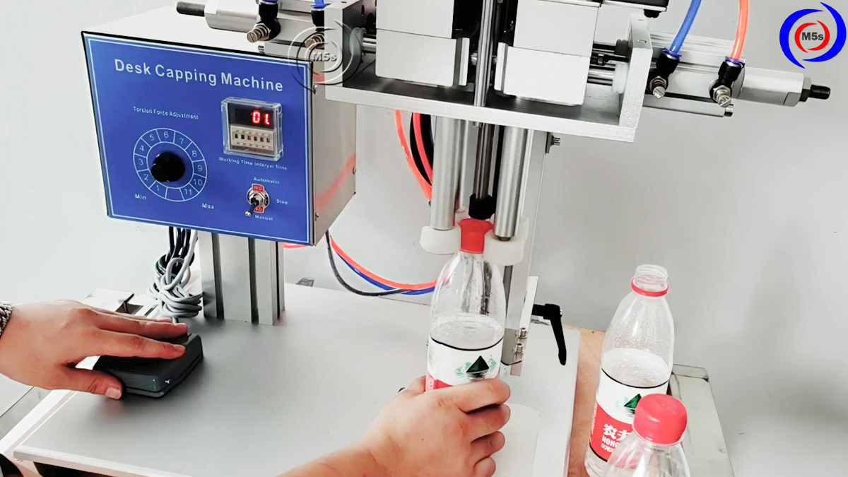 thành phẩm máy đóng nắp chai DN-100 thành phẩm máy đóng nắp chai DN-100