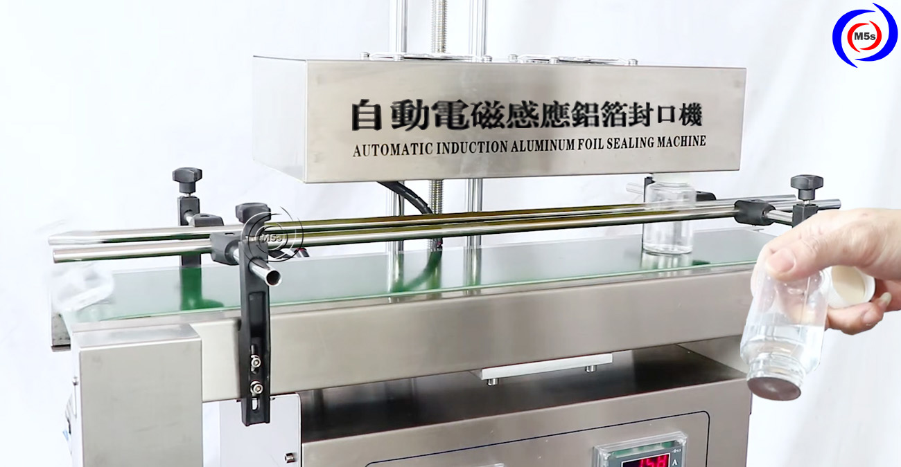 Hình thực tế máy dán màng seal tự động GLF-1300 Hình thực tế máy dán màng seal tự động GLF-1300