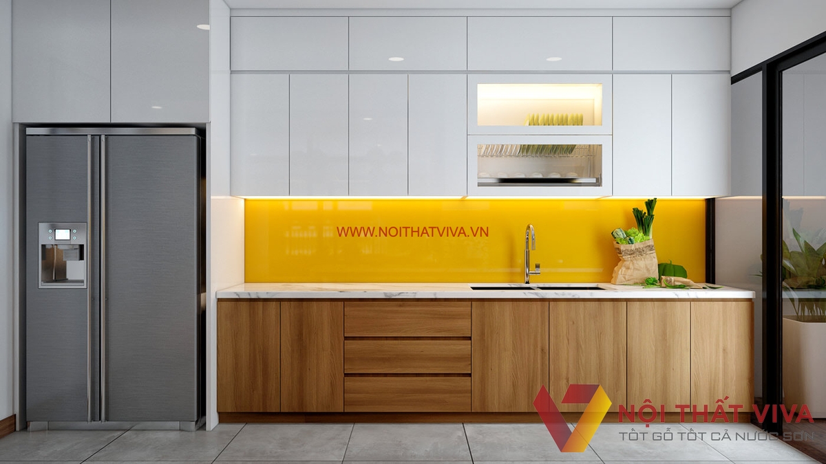 Tủ bếp âm tường gỗ MDF melamine phối màu vàng trắng là sự lựa chọn đầy ấn tượng cho những ai muốn tạo điểm nhấn thẩm mỹ cho không gian nhà bếp. Tủ bếp này được thiết kế liền mảnh với tường, giúp tiết kiệm diện tích và tạo cảm giác gọn gàng cho không gian. Với màu vàng trắng tươi mới, tủ bếp này sẽ mang đến không gian năng động và tinh tế.