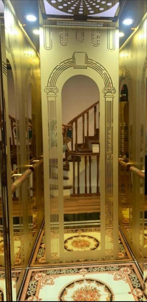 Inox hoa văn cổng vòm vàng