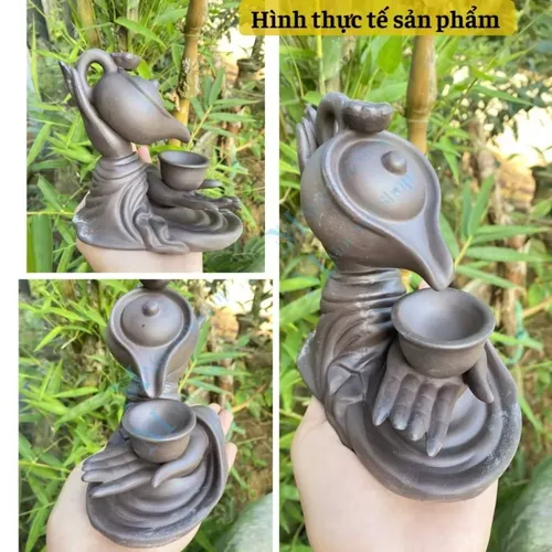 Thác Khói Trầm Hương Mẫu Tay Nâng Ấm Trà