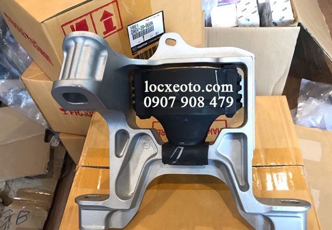 Chân máy trước xe ô tô mazda 2 Chân máy trước xe ô tô mazda 2