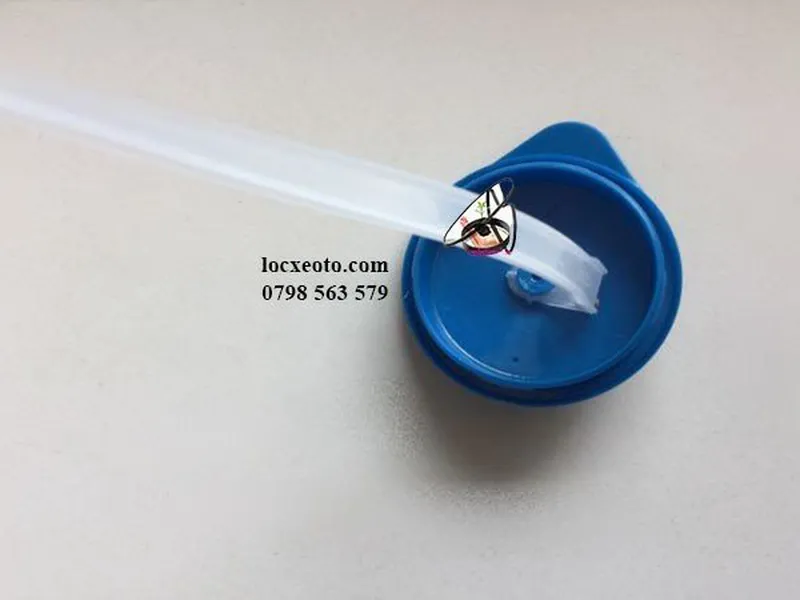 Nắp bình nước rửa kính mazda 3