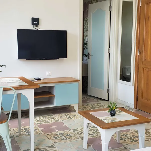 Pastel Studio | Binh Thanh | Balcony, kitchen, sofa & desk | Pool on the roof