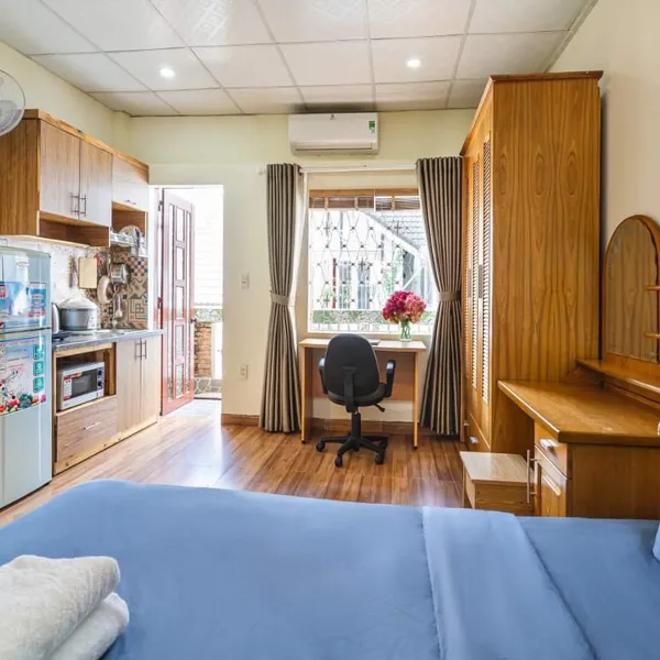 Wooden floor studio in District 1, 30m2, balcony , Fully furnished