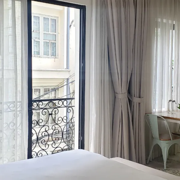 Pastel Studio | Binh Thanh | Balcony, kitchen, sofa & desk | Pool on the roof