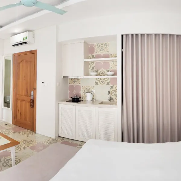 Pastel Studio | Binh Thanh | Balcony, kitchen, sofa & desk | Pool on the roof