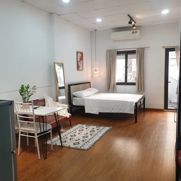 Studio apartment with windows and a sunny balcony | near Bitexco | District 1