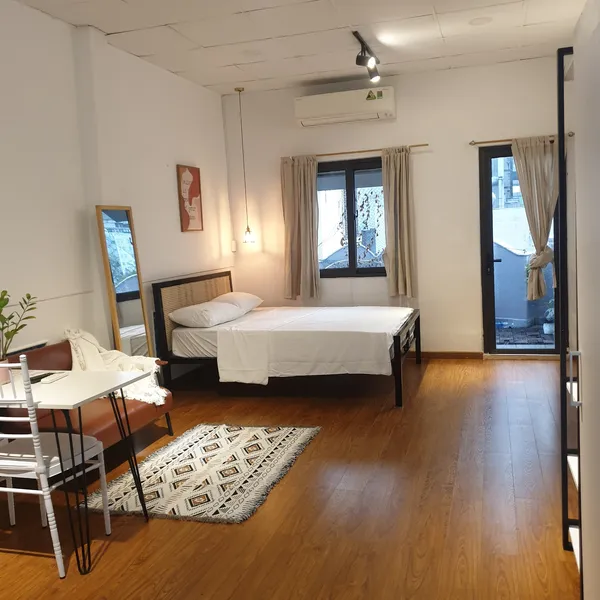 Studio apartment with windows and a sunny balcony | near Bitexco | District 1