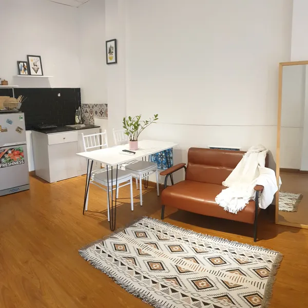 Studio apartment with windows and a sunny balcony | near Bitexco | District 1