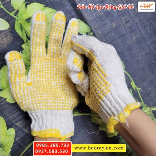Bao tay len phủ hạt nhựa màu vàng. Bao tay len phủ hạt nhựa màu vàng.