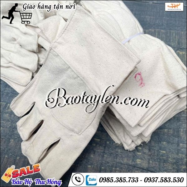 Găng tay bảo hộ vải bạt chống cắt, chống mài mòn. Găng tay bảo hộ vải bạt chống cắt, chống mài mòn.