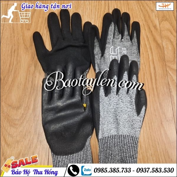 Găng tay phủ cao su chống cắt. Găng tay phủ cao su chống cắt.