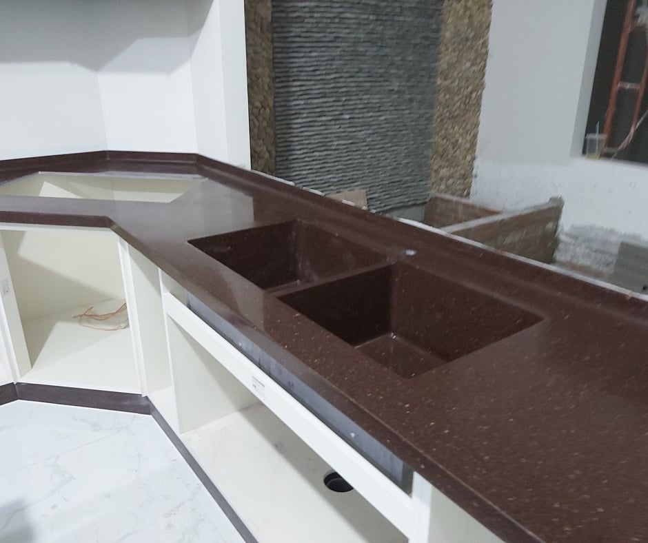 Tìm hiểu giá tại Bến Tre lắp đặt bồn rửa liền khối mặt bếp đá solid surface