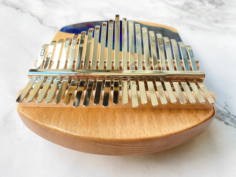 Đàn kalimba 21 phím Gỗ Nguyên Khối Cá Xanh Khảm Bo Góc Đàn kalimba 21 phím Gỗ Nguyên Khối Cá Xanh Khảm Bo Góc
