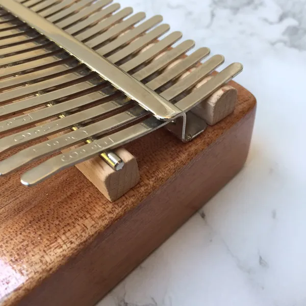 Đàn Kalimba 17 Phím Gỗ Mun Ebony Âm Đáy Vũ Công Purm KaLinh