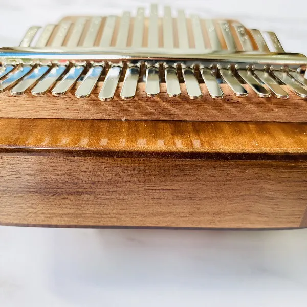 Đàn Kalimba 17 Phím Gỗ Walnut Âm Đáy Hluru KaLinh