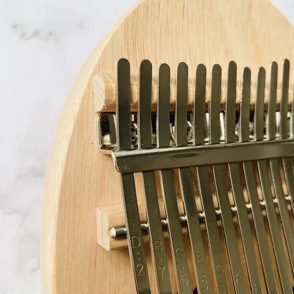 Đàn Kalimba 17 Phím Gỗ Phong/Mahogayny Nguyên Khối Khảm Vết Chân KaLinh