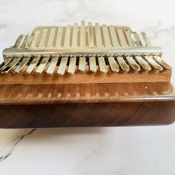 Đàn Kalimba 17 Phím Gỗ Nguyên Khối Bo Eo Walnut KaLinh
