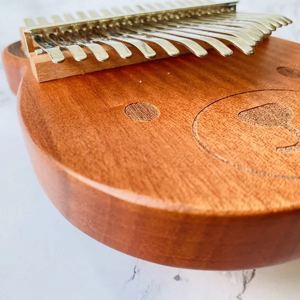 Đàn Kalimba 17 Phím Gỗ Sapele Đỏ Nguyên Khối Gấu Bo KaLinh