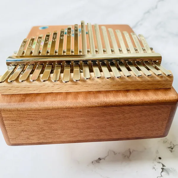 Đàn Kalimba 17 Phím Âm Đáy Khảm Hoa Purm Gỗ Mahogany / Vân Sam