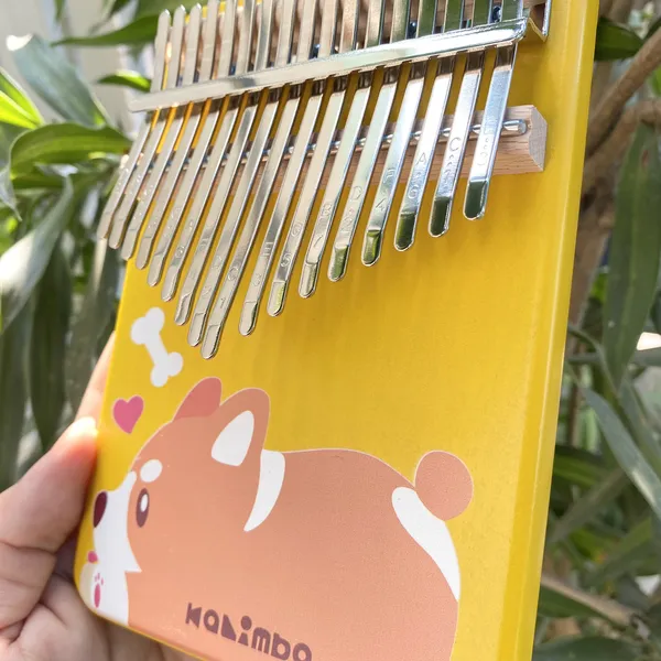 Đàn Kalimba 17 Phím Nguyên Khối Mahogany Cún Vàng KaLinh