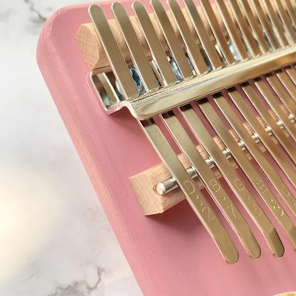 Đàn Kalimba 17 Phím Nguyên Khối Mahogany Kì Lân Hồng KaLinh
