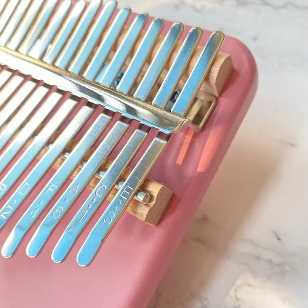 Đàn Kalimba 17 Phím Nguyên Khối Mahogany Kì Lân Hồng KaLinh