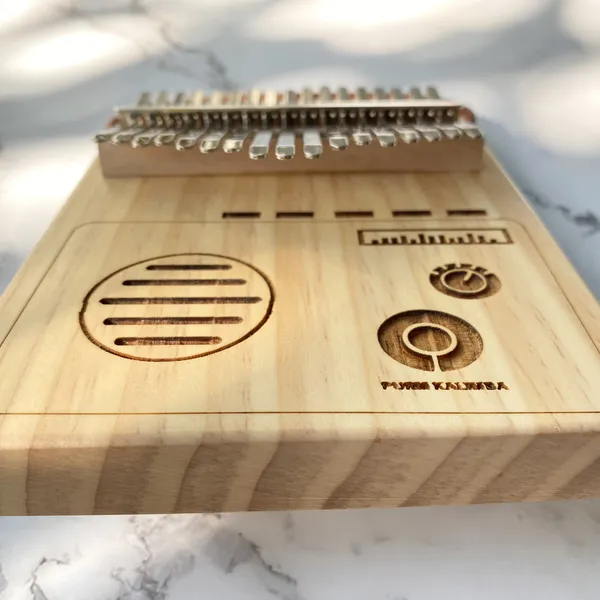 Đàn Kalimba 17 Phím Gỗ Vân Sam Nguyên Khối Radio Purm