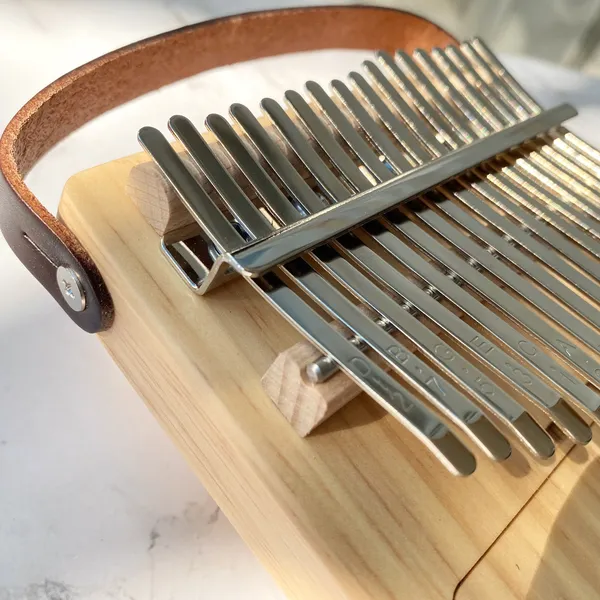 Đàn Kalimba 17 Phím Gỗ Vân Sam Nguyên Khối Radio Purm